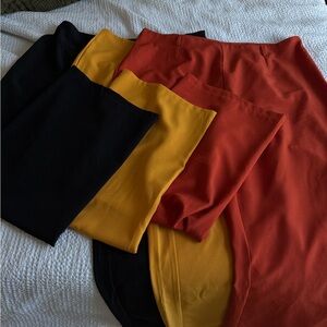 SHEIN Curve Pant Set in Black, Yellow, and Orange. Zipper in side. Belt loops.